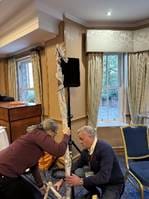 A person and person working on a project
AI-generated content may be incorrect.